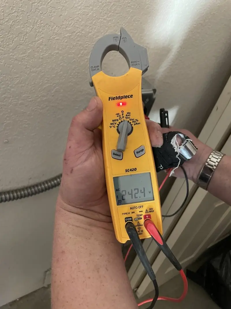 Voltage testing with clamp meter during Circuit Breaker Repair in Timberville